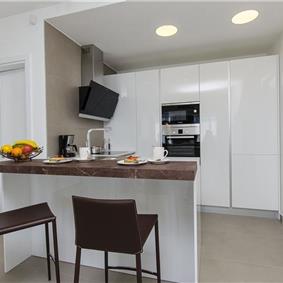 5 bedroom beachfront villa with heated pool near Omis, sleeps 9